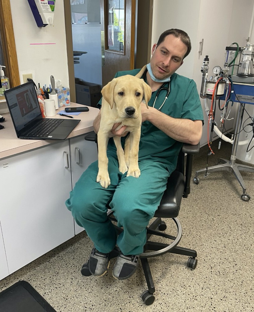Dr Carr Holding Puppy
